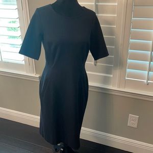 Short sleeved black ponte sheath dress. land’s end